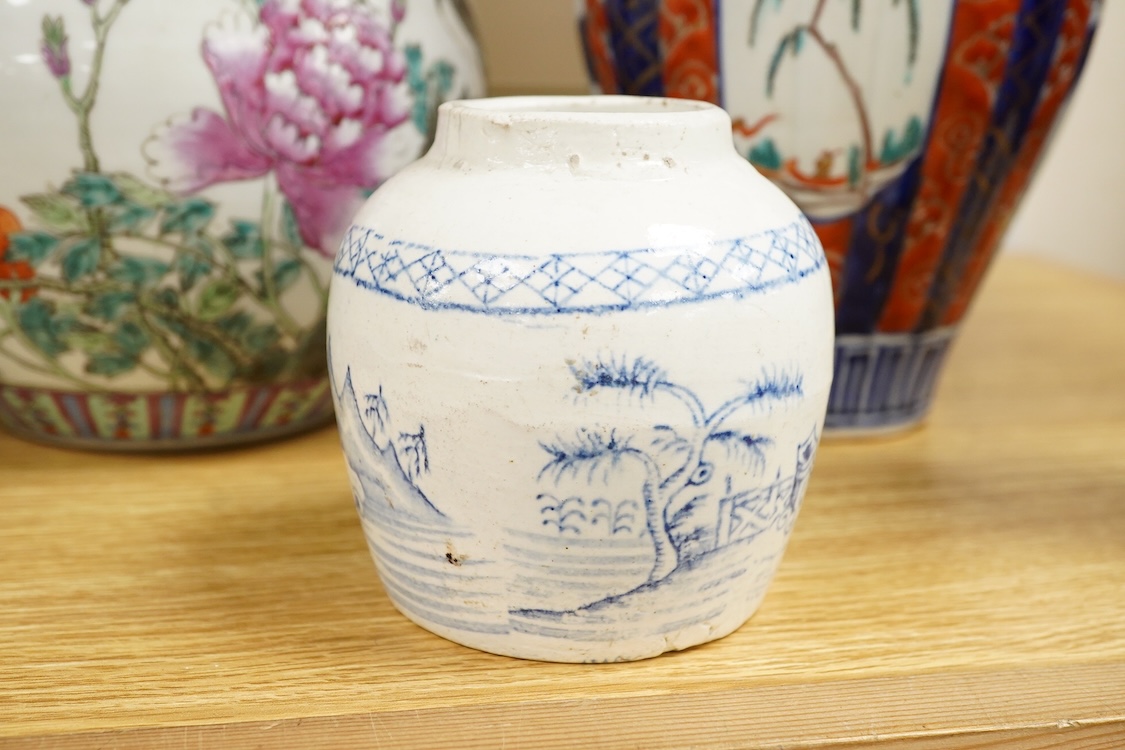 An Imari vase and cover-28cm high, a Chinese jar and prunus vase and a small blue and white jar.